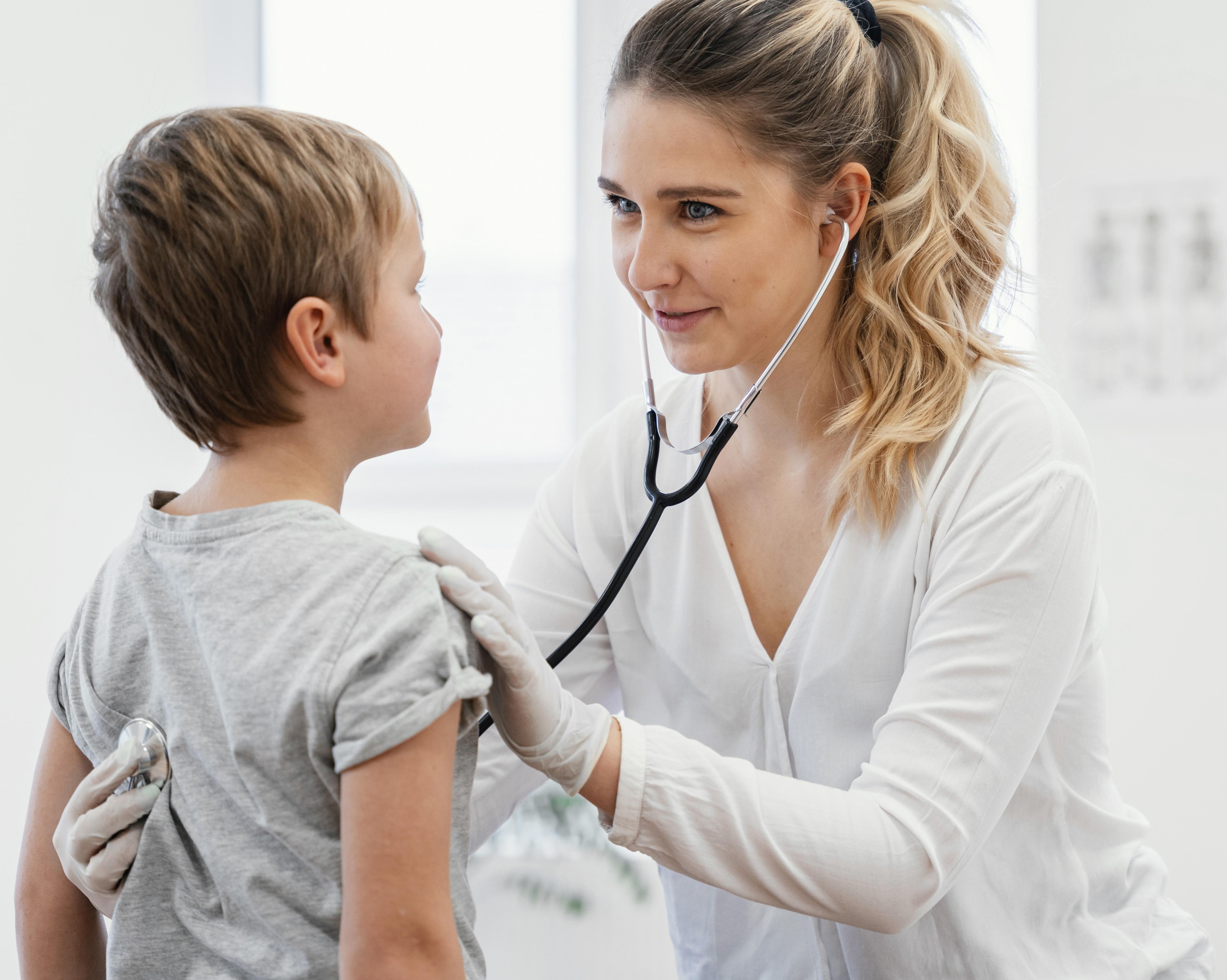 Pediatrician Checking Child